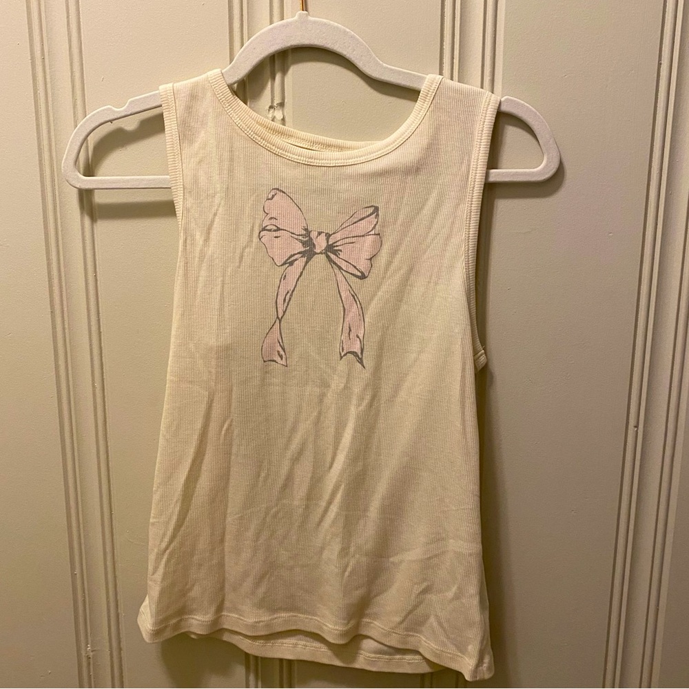 American Eagle Cream Tank Top with Pink Bow Design